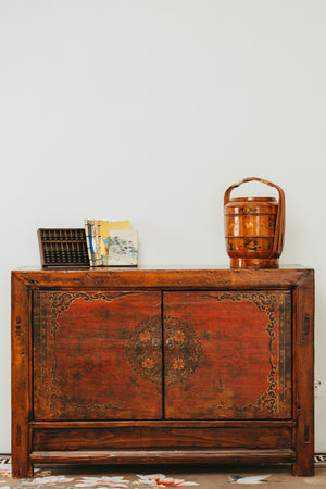 Wooden Sideboard with Reddish Hue