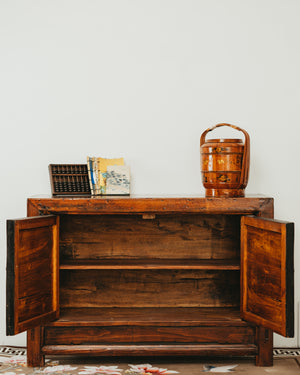 Wooden Sideboard with Reddish Hue