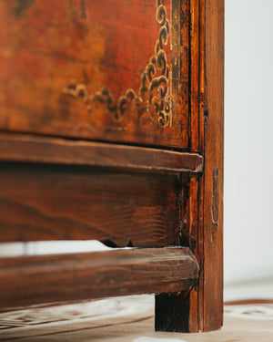 Wooden Sideboard with Reddish Hue