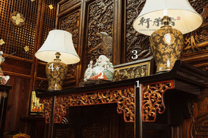 An elegant intricately carved everted flange console table