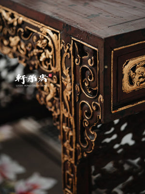 writing table with elaborately carved spandrels and apron