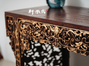 writing table with elaborately carved spandrels and apron
