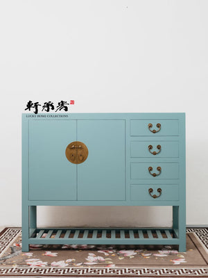 A Turquoise Tansu-Inspired Cabinet