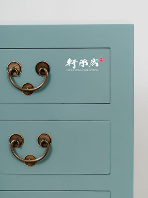 A Turquoise Tansu-Inspired Cabinet