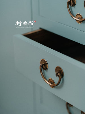 A Turquoise Tansu-Inspired Cabinet