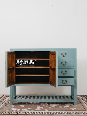 A Turquoise Tansu-Inspired Cabinet