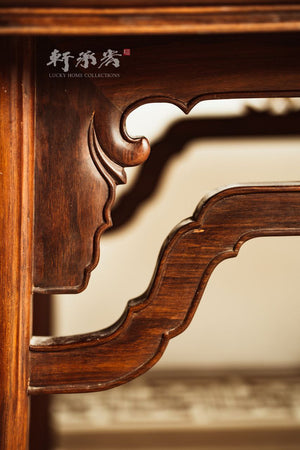 An elegant Ming-style mahogany coffee table