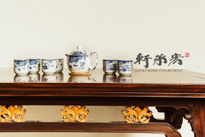 An elegant Ming-style mahogany coffee table