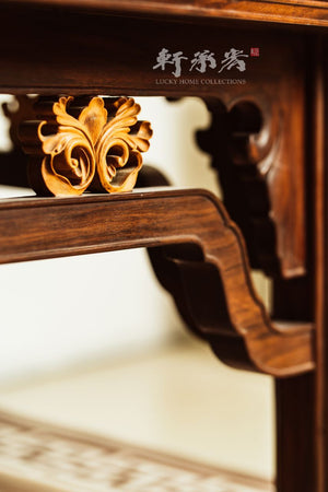 An elegant Ming-style mahogany coffee table