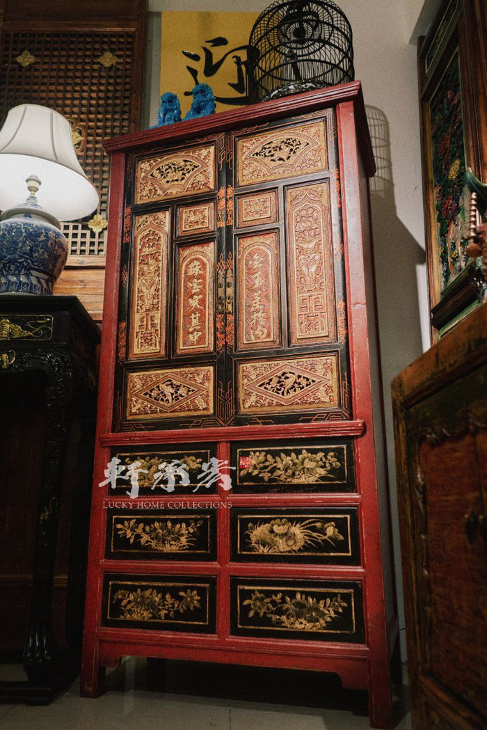 Cabinet with Elaborately Carved Reliefs