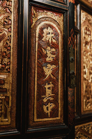 Cabinet with Elaborately Carved Reliefs